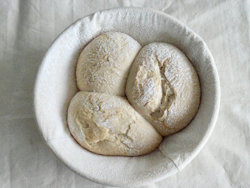 Brown bread on white ceramic plate